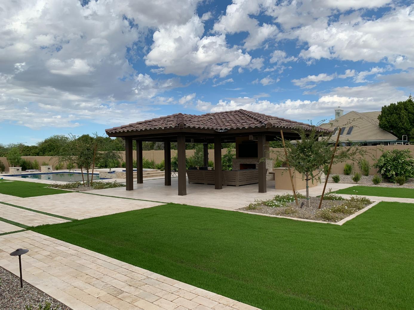 Professional Shade Structures and Pergolas with mower and trimming equipment